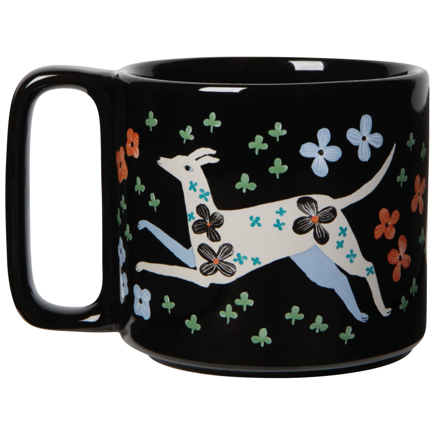 Black mug with a white dog and floral design on a white background