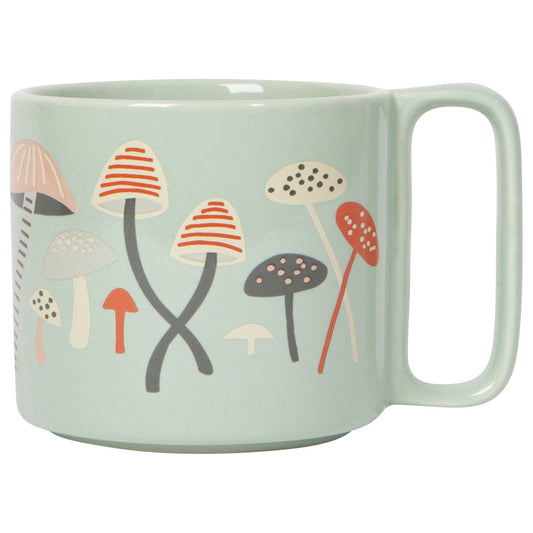 Mint green mug with mushroom pattern on a white background